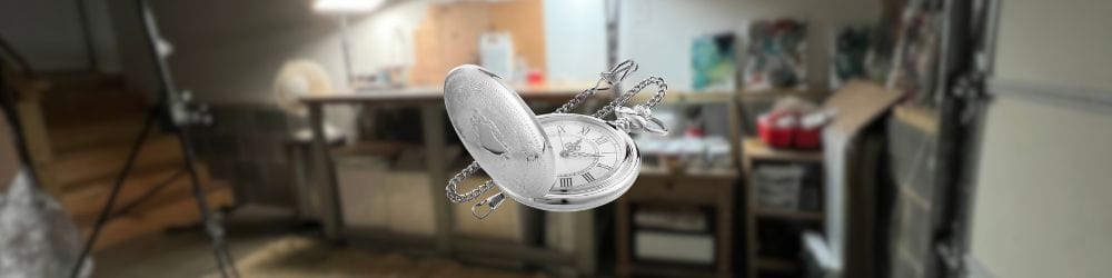 Blurred garage studio background with symbolic clock overlay for watercolor growth.